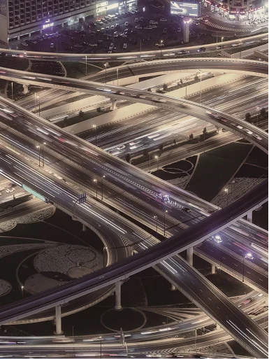 Listing image depicting an aerial view of multiple roads and bridges.