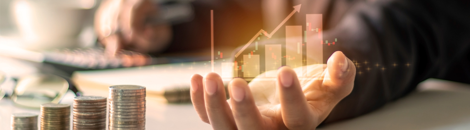 Article cover image depicting an open hand with a bar graph.